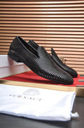 Versace Textured Black Slip-On Shoes — hero