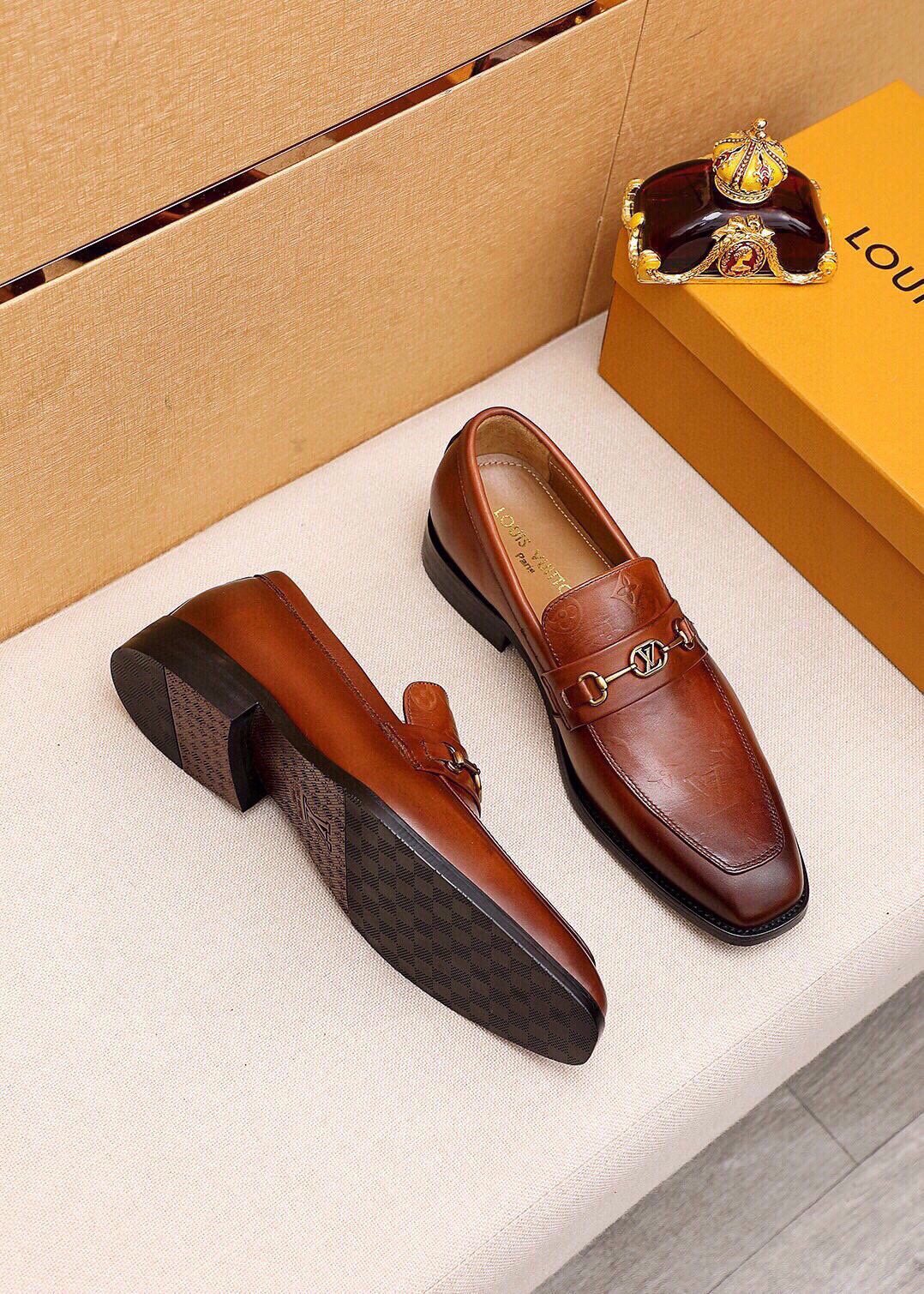 Louis Vuitton Embossed Buckle Loafers — front