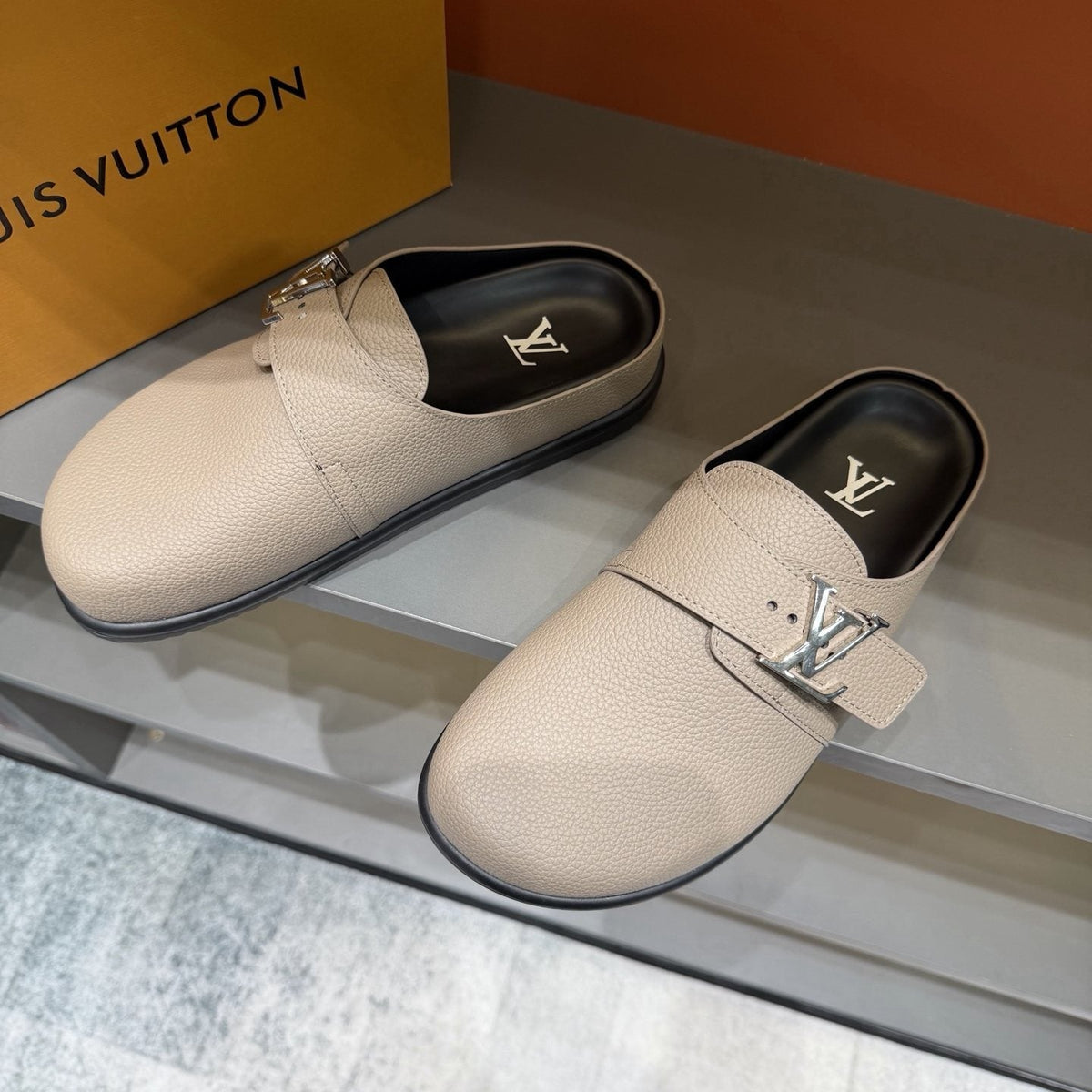 Louis Vuitton Textured Buckle Slide Sandals — front