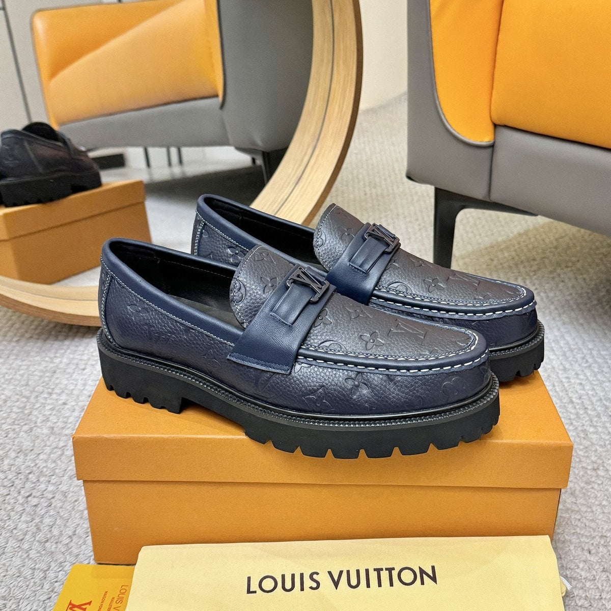 Louis Vuitton Embossed Lug Sole Loafers — front