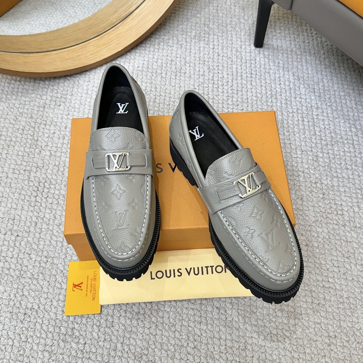 Louis Vuitton Embossed Lug Sole Loafers — front
