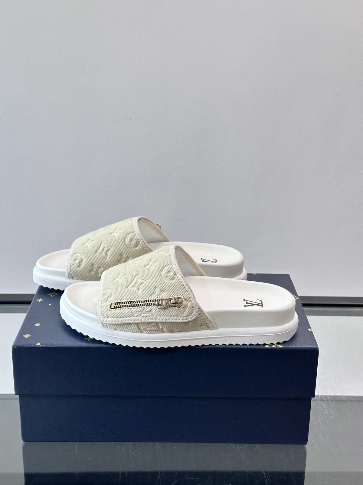 Louis Vuitton Embossed Strap Slide Sandals — hero