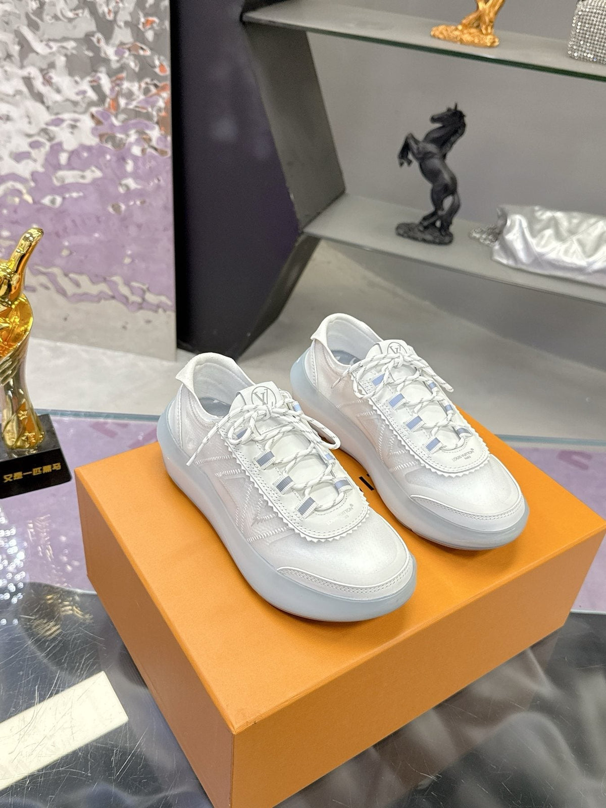 Louis Vuitton Aqua Blue and White Low-Top Sneakers — front