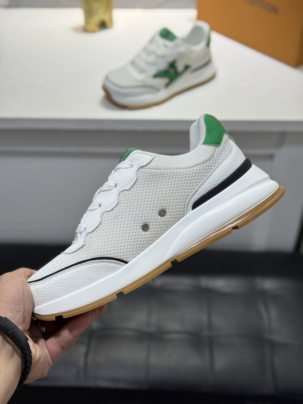 Louis Vuitton Low-Top Logo Sneakers — side