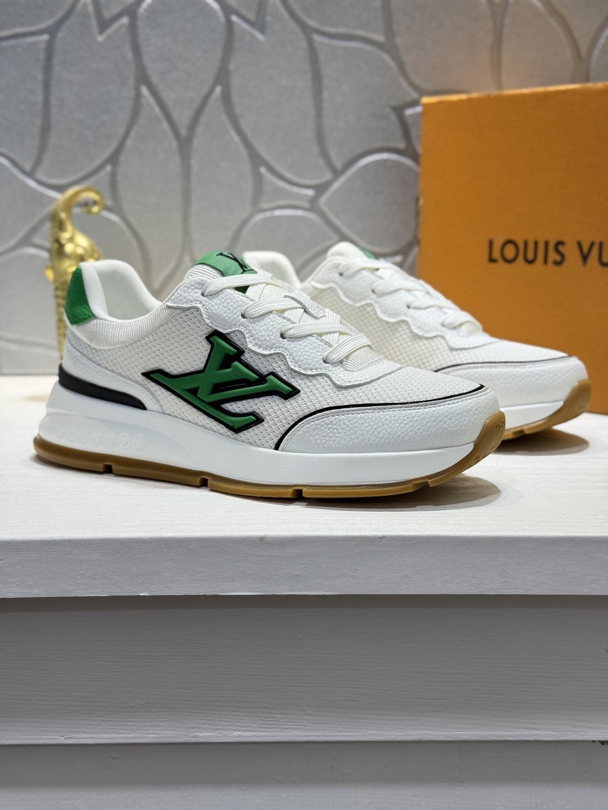 Louis Vuitton Low-Top Logo Sneakers — front