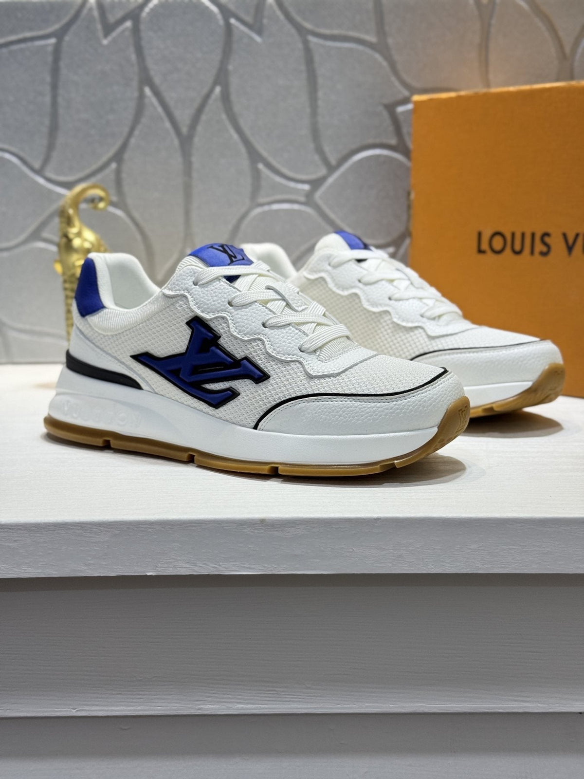 Louis Vuitton Low-Top Logo Sneakers — front