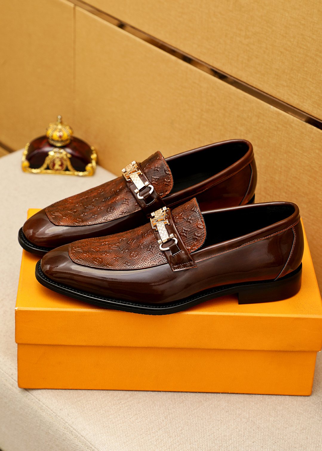 Louis Vuitton Embossed Buckle Loafers — hero