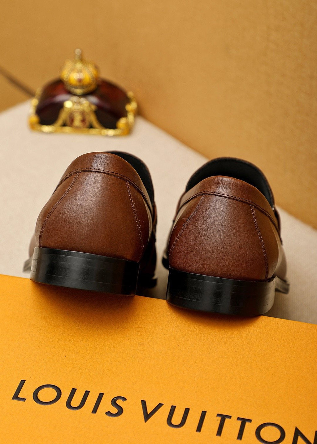 Louis Vuitton Embossed Buckle Loafers — back