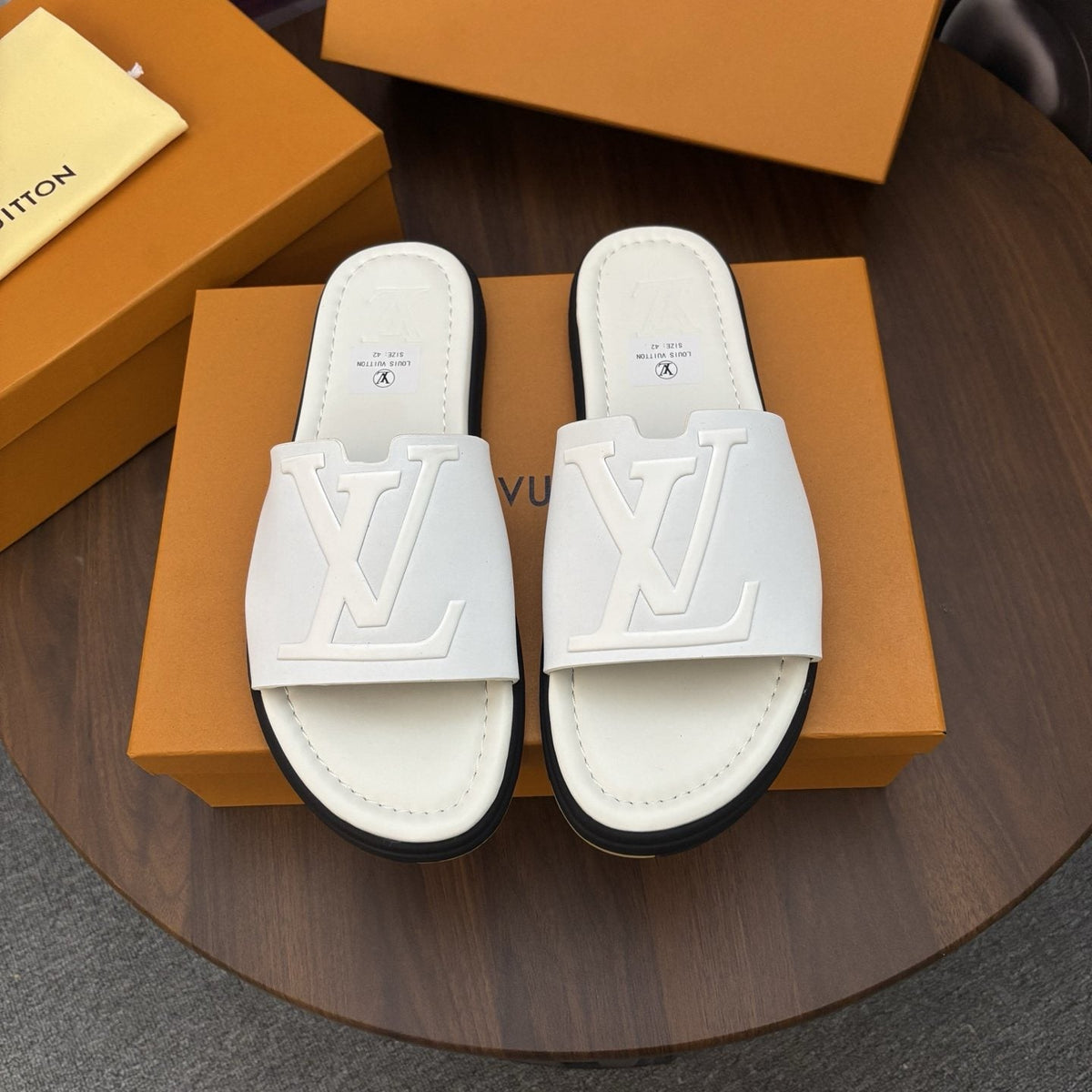 Louis Vuitton Raised-Monogram Slide Sandals — front