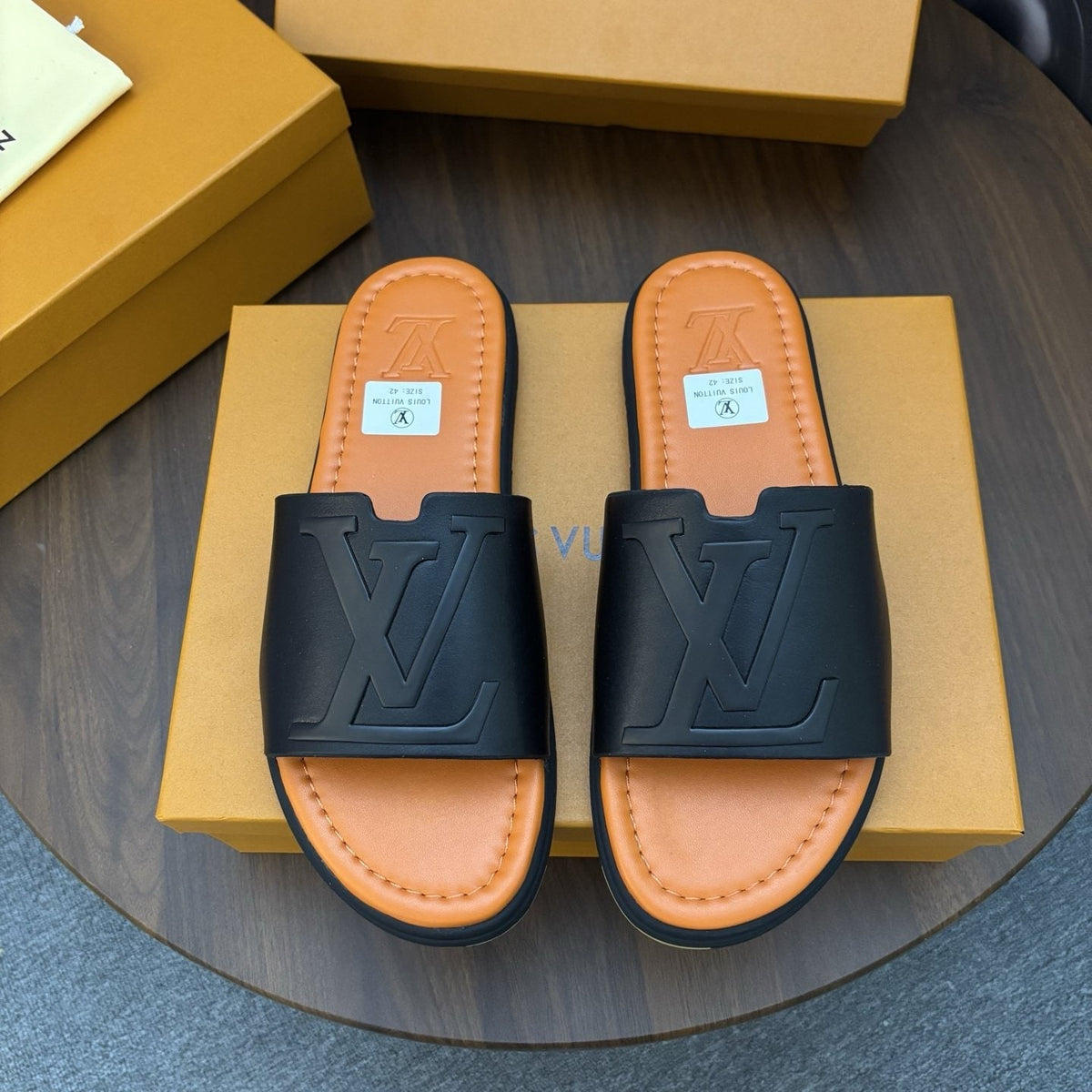 Louis Vuitton Raised-Monogram Slide Sandals — front