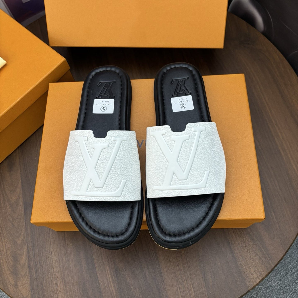 Louis Vuitton Raised-Monogram Slide Sandals — front