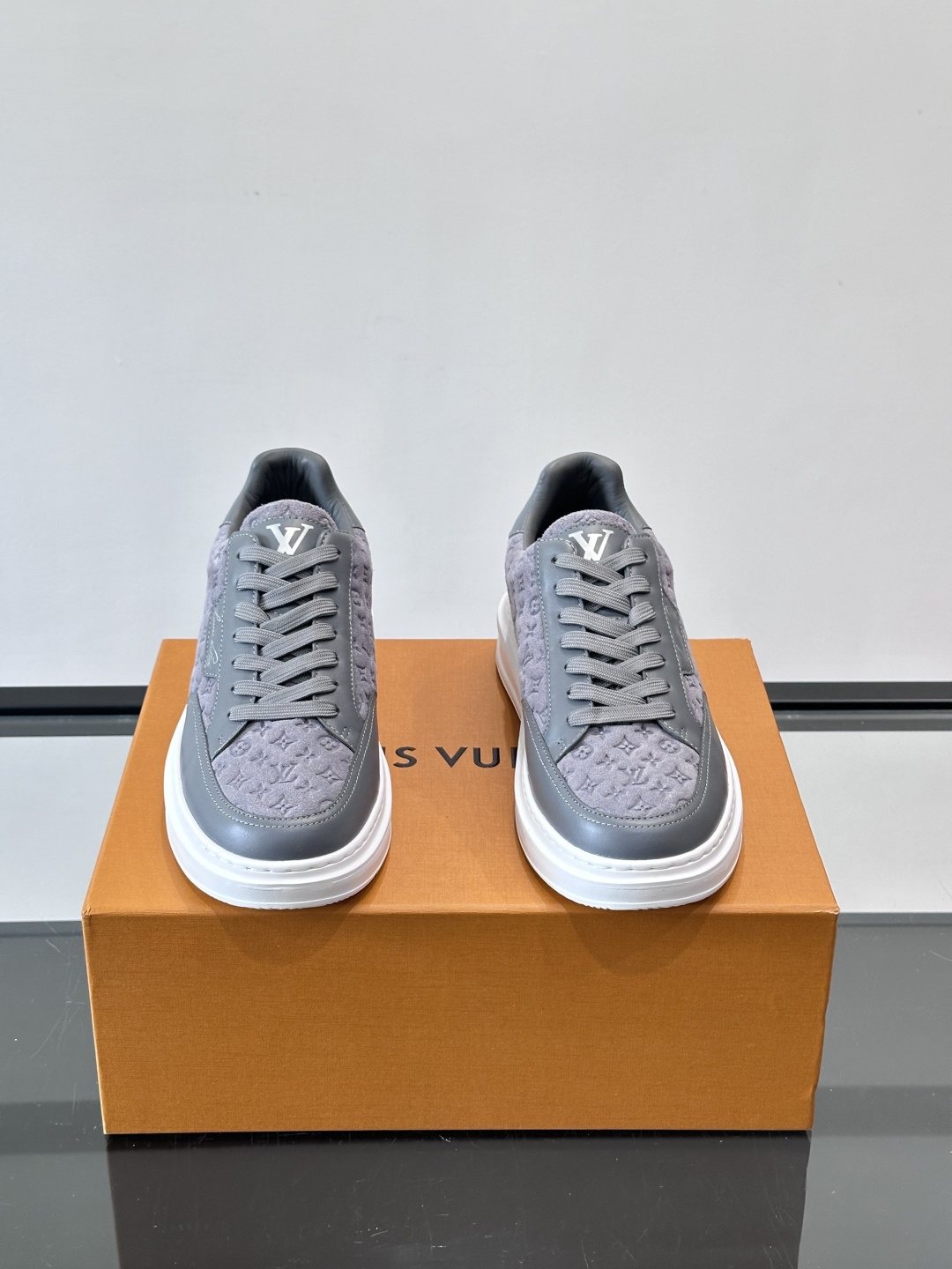 Louis Vuitton Embossed Low-Top Sneakers — hero