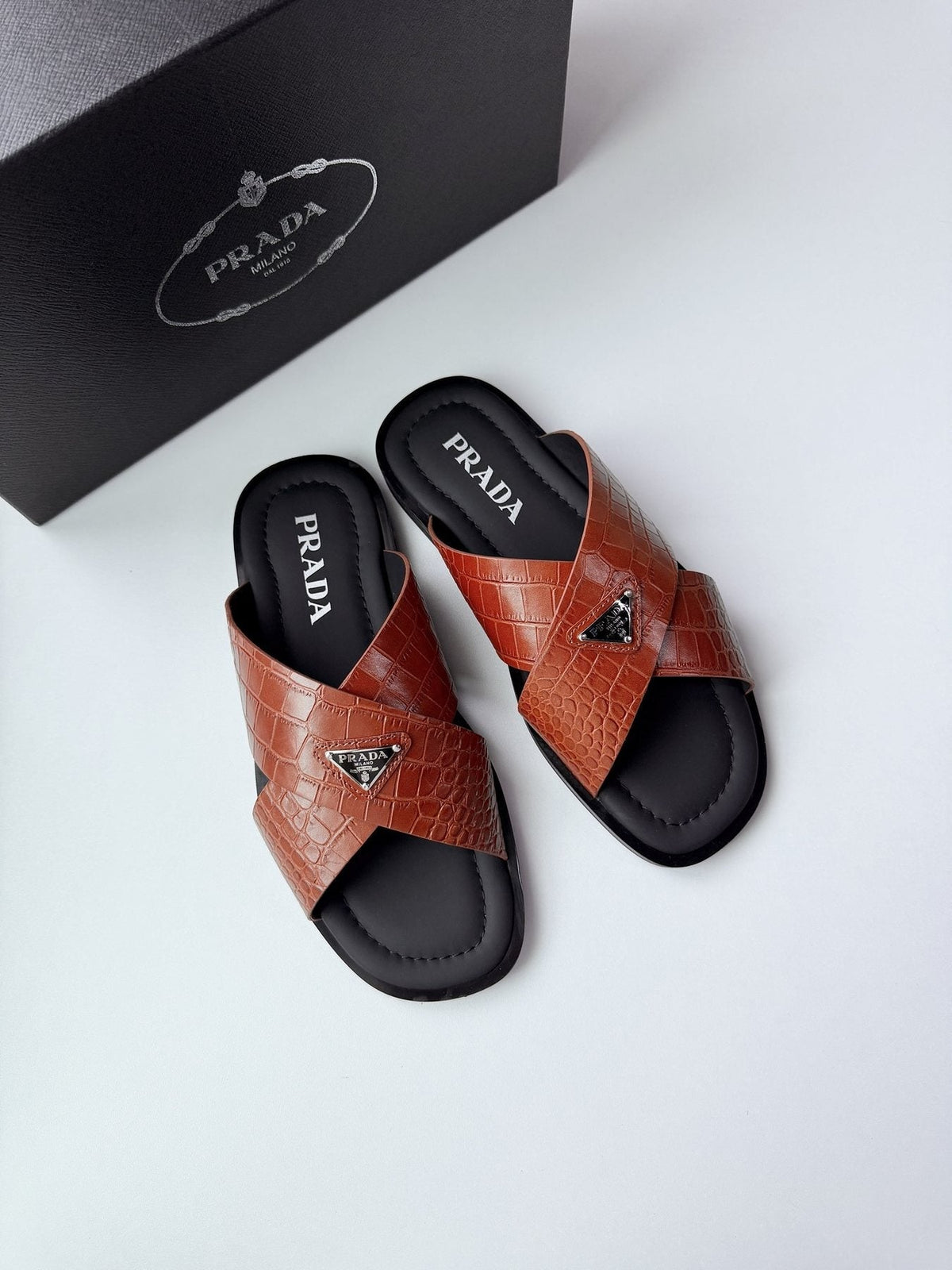 Prada Croc-Embossed Cross-Strap Slide Sandals — front