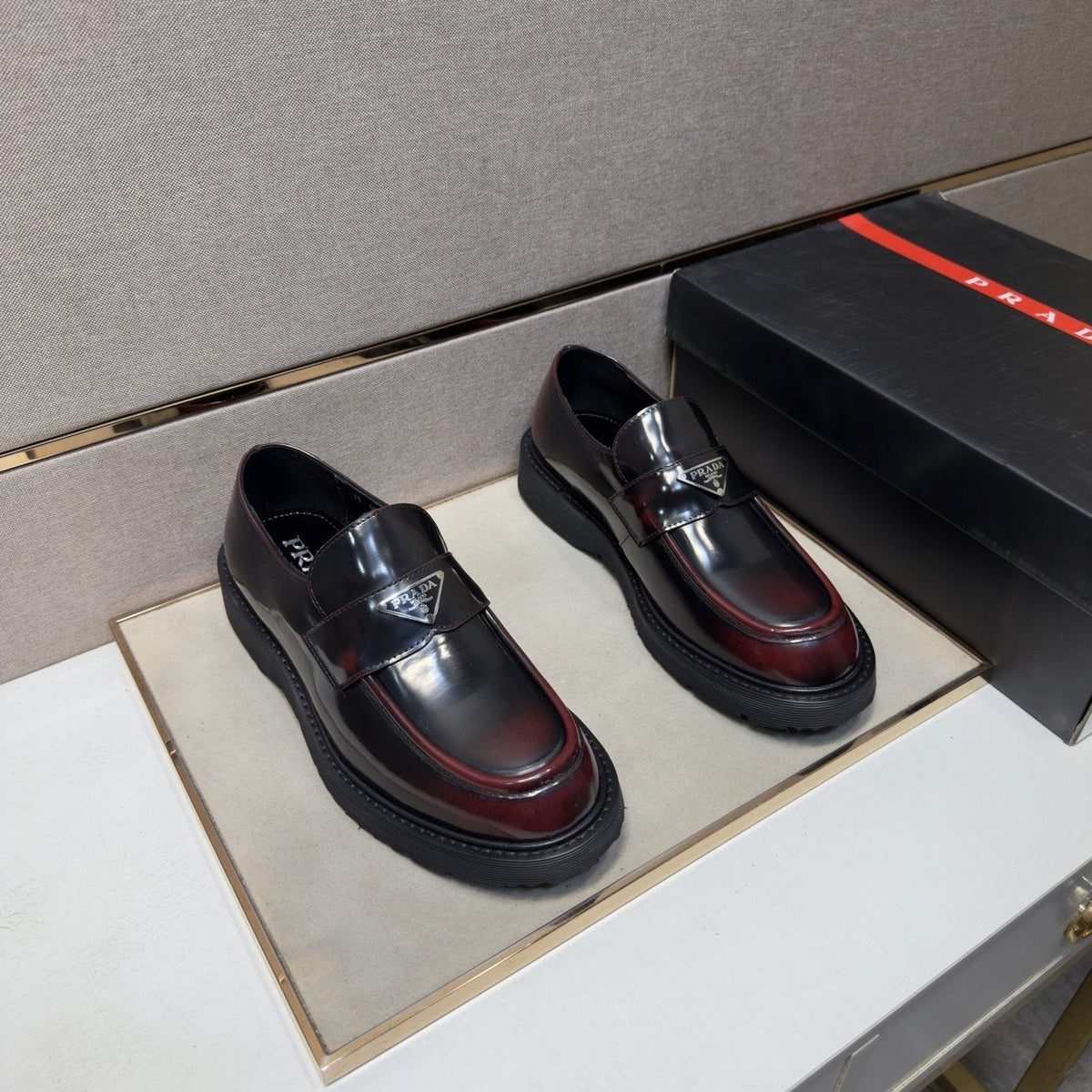Prada Black Lug Sole Slip-On Shoes — front