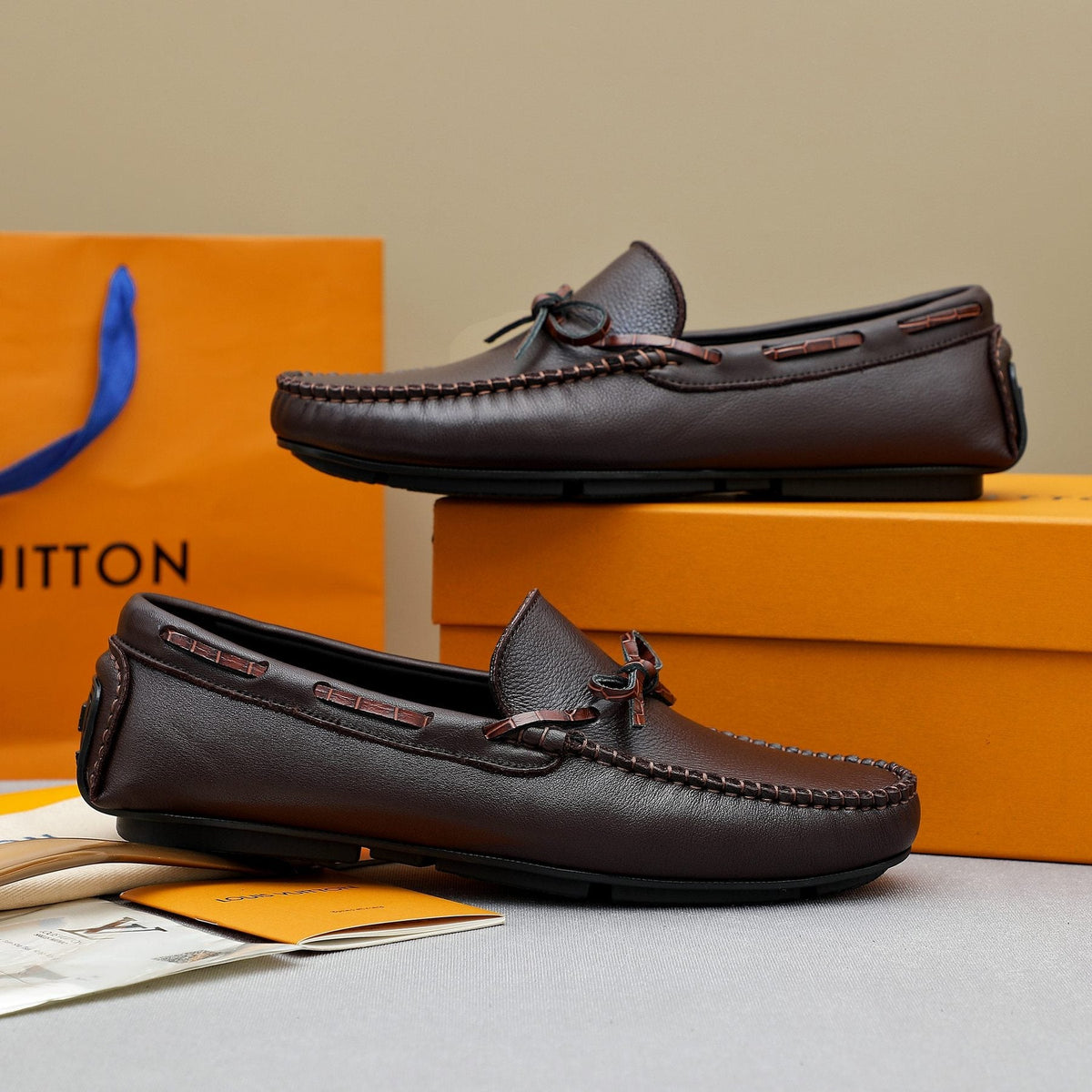 Louis Vuitton Bow Moc-Toe Loafers — front
