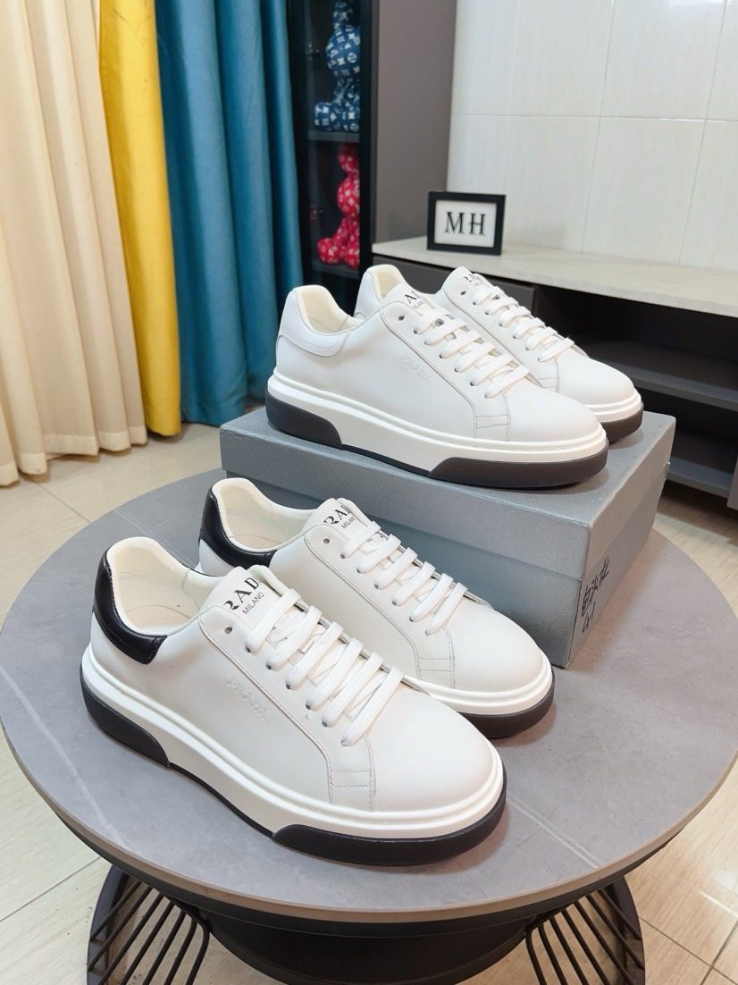 Prada Triangle Patch Low-Top Sneakers — front