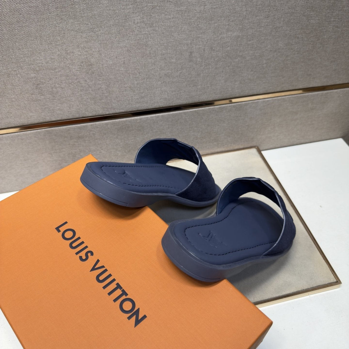 Louis Vuitton Embossed Strap Slide Sandals — hero