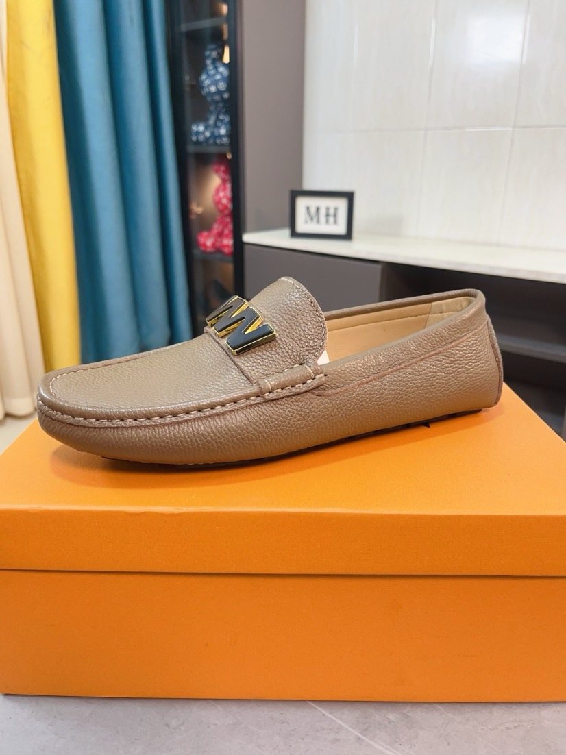 Louis Vuitton Blue Pebbled Driving Loafers — front