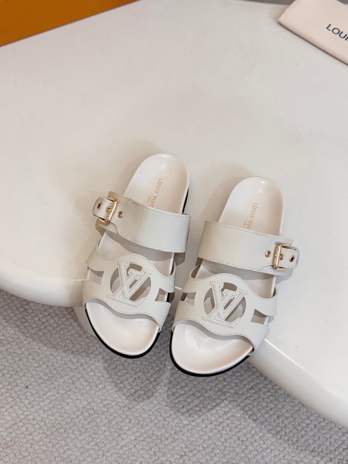Louis Vuitton Cutout Buckle Slide Sandals — front
