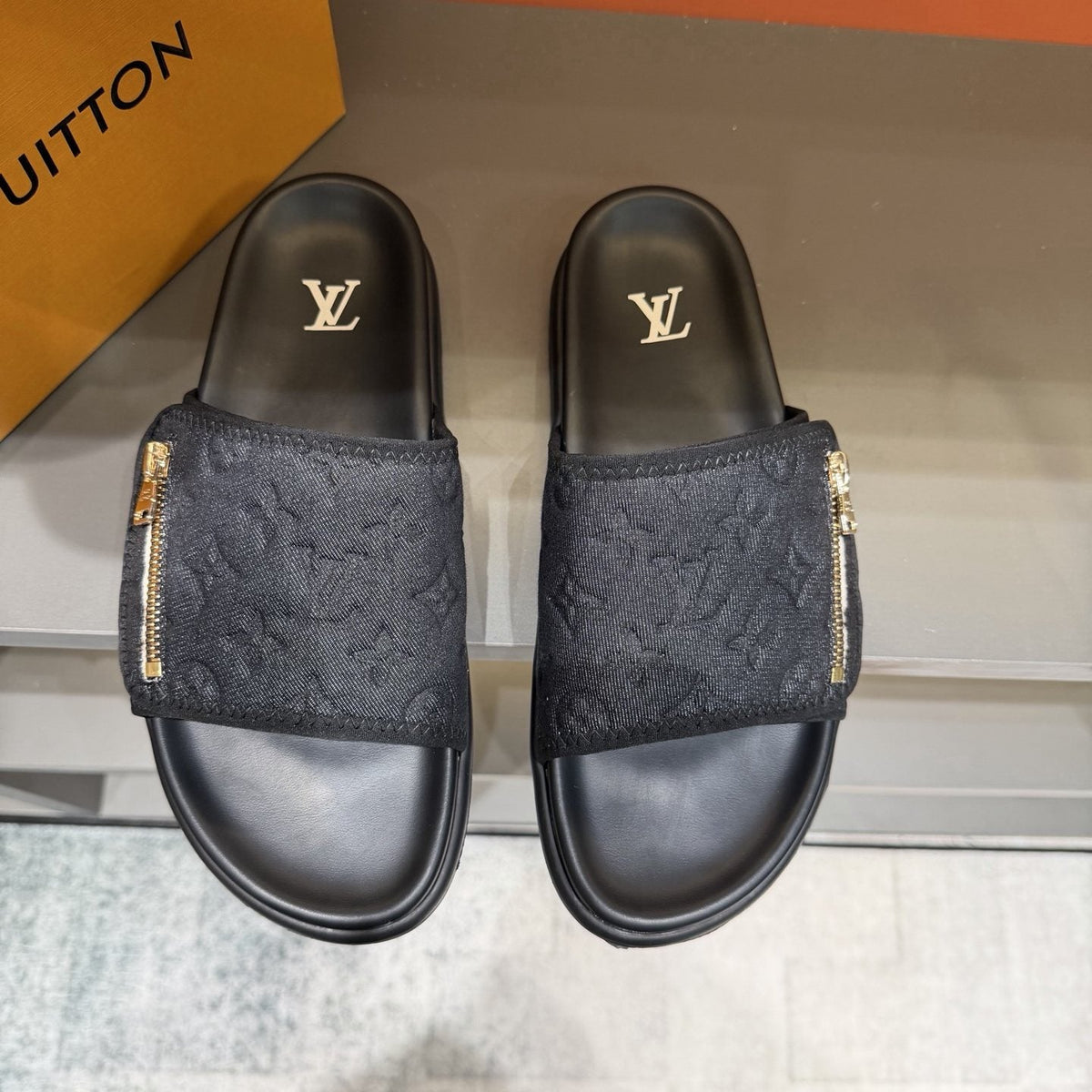 Louis Vuitton Embossed Zip Slide Sandals — front