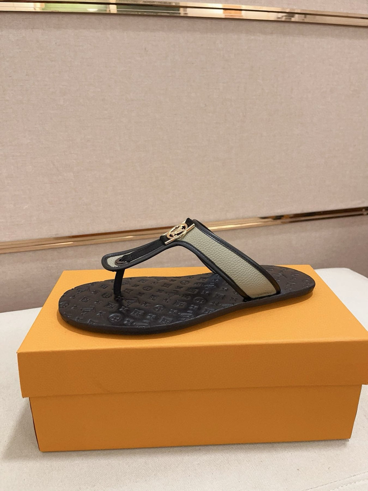 Louis Vuitton Emblem Thong Sandals — front