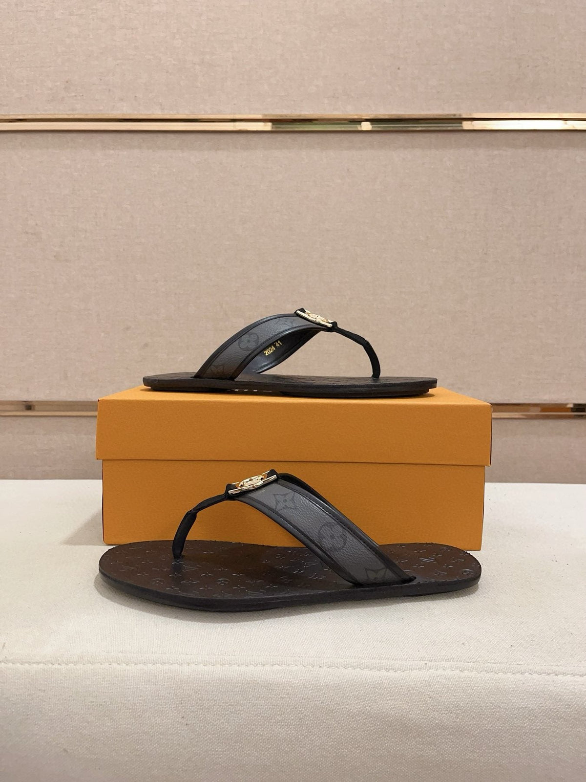 Louis Vuitton Emblem Thong Sandals — front