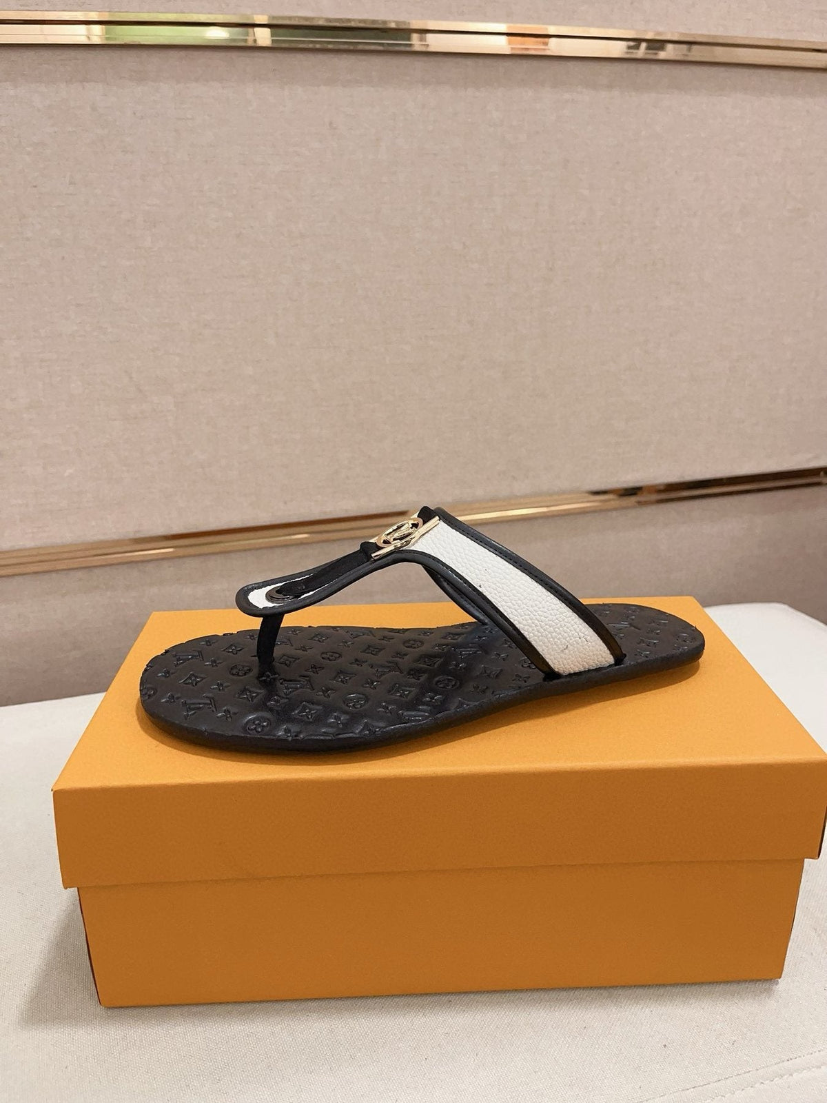 Louis Vuitton Emblem Thong Sandals — front