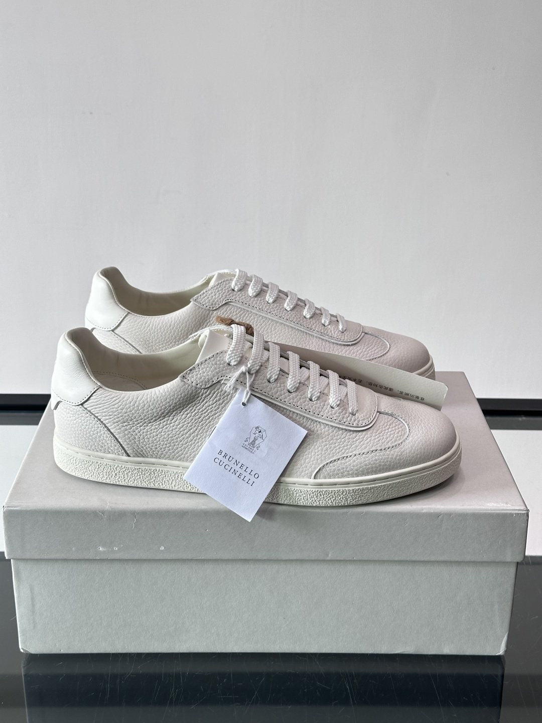 Brunello Cucinelli Off-White Low-Top Sneakers — hero