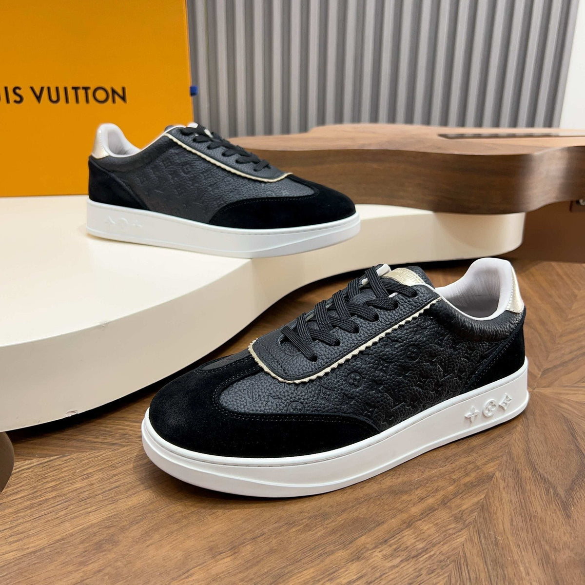 Louis Vuitton Embossed Low-Top Sneakers — front
