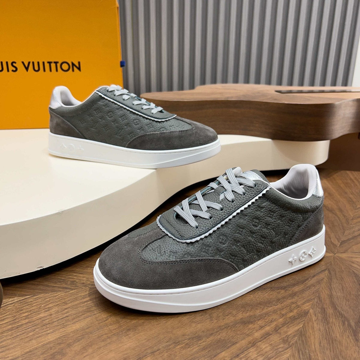 Louis Vuitton Embossed Low-Top Sneakers — front