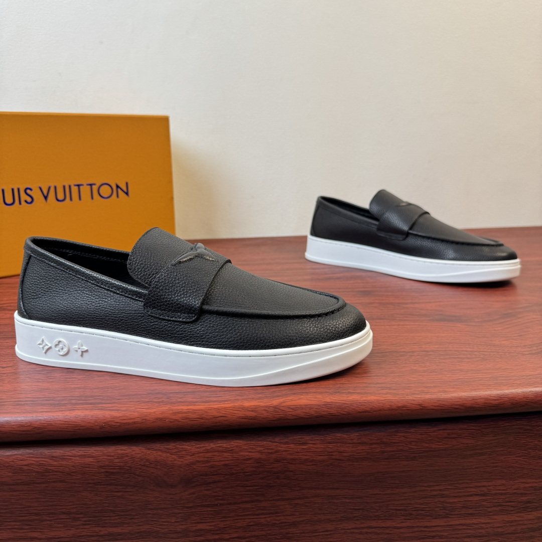 Louis Vuitton Textured Slip-On Loafers — front
