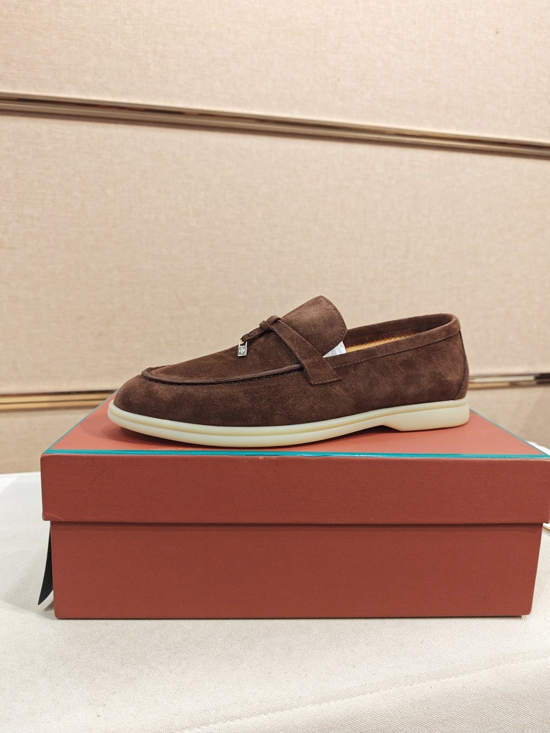 Loro Piana Metal-Charm Moc Toe Loafers — front