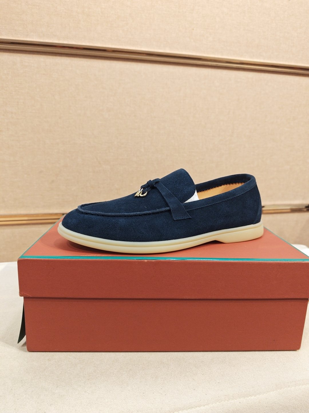 Loro Piana Metal-Charm Moc Toe Loafers — front