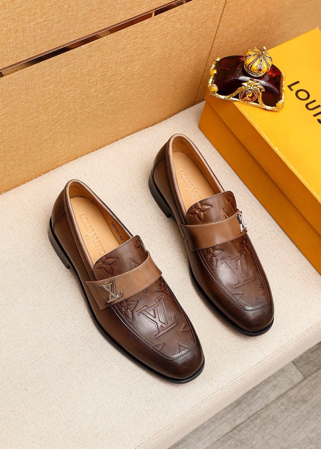 Louis Vuitton Embossed Leather Loafers — front