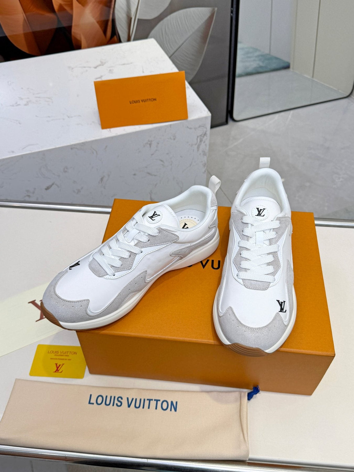 Louis Vuitton Cream Patterned Low-Top Sneakers — front