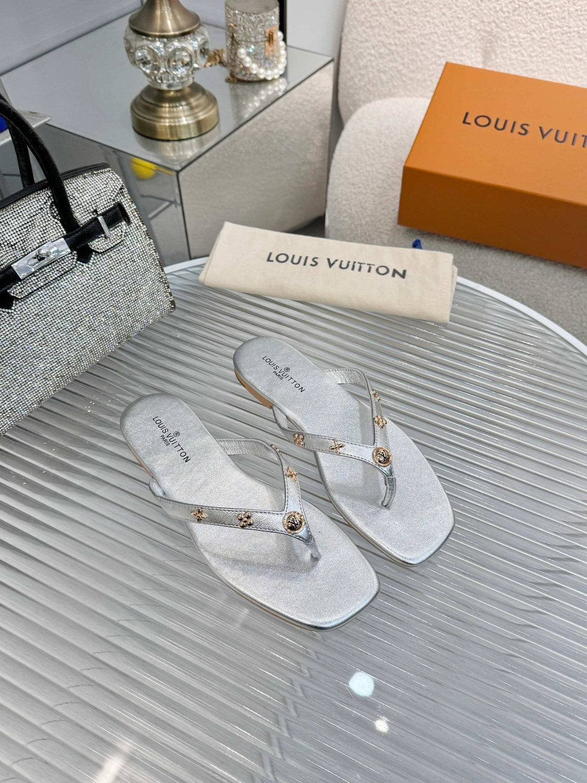 Louis Vuitton Metal-Detail Thong Sandals — front