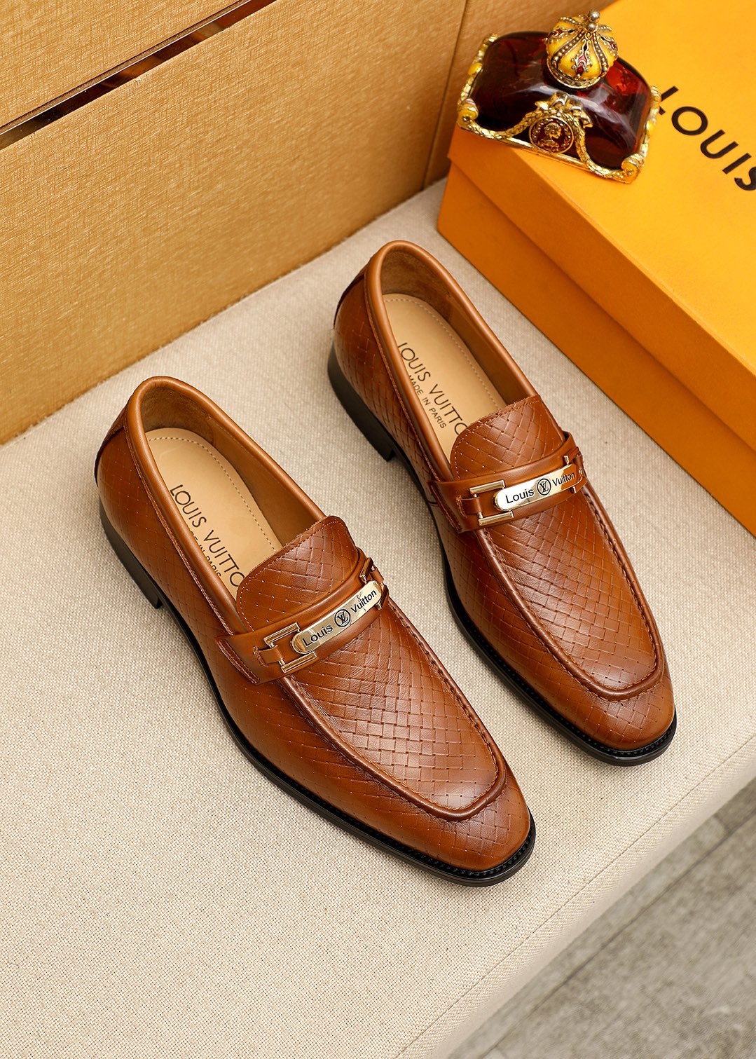 Louis Vuitton Brown Embossed Buckle Loafers — hero